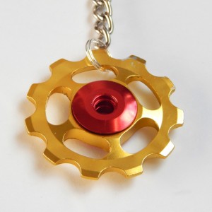 gold Jockey wheel key ring